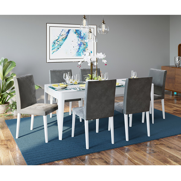 وسایل پذیرایی روی میز قرار گرفته و ست صندلی طوس رنگ دور یک میز به رنگ سفید قرار دارد.